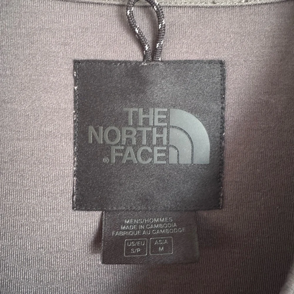 The North Face Black and Gray Jacket with Kangaroo Pocket